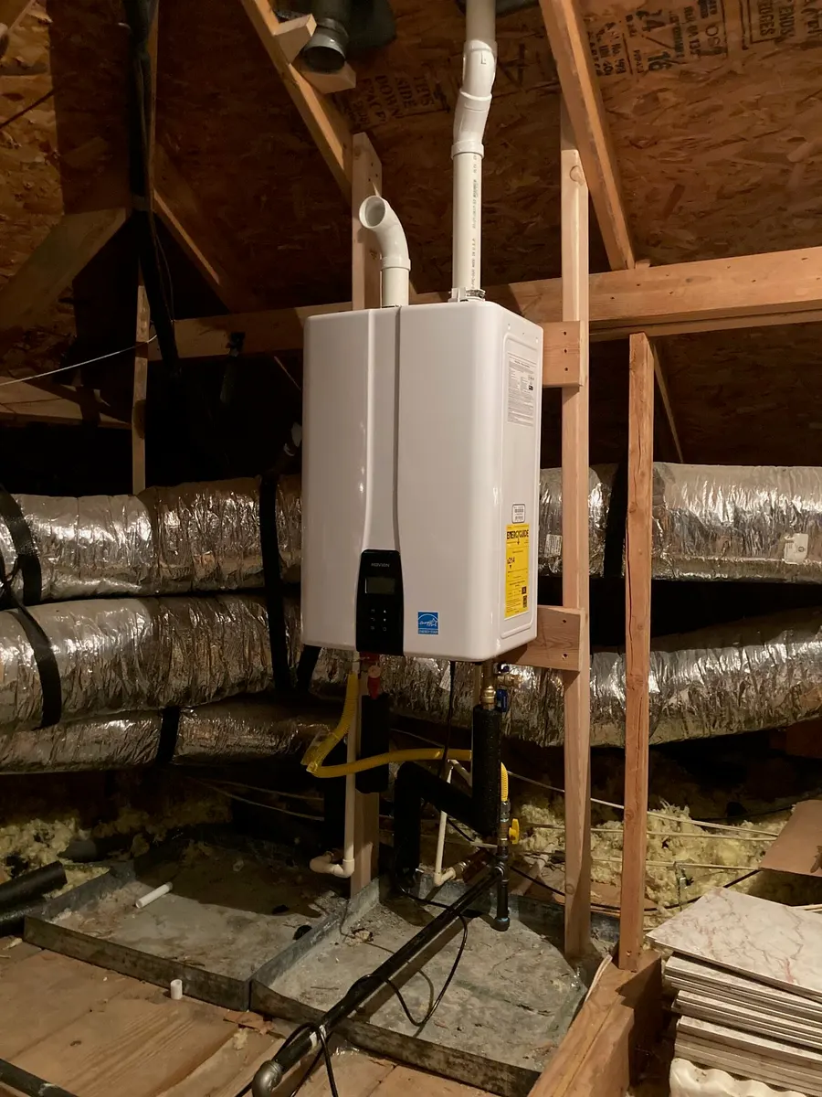 An attic after a tankless water heater conversion by TD Plumbing Solutions